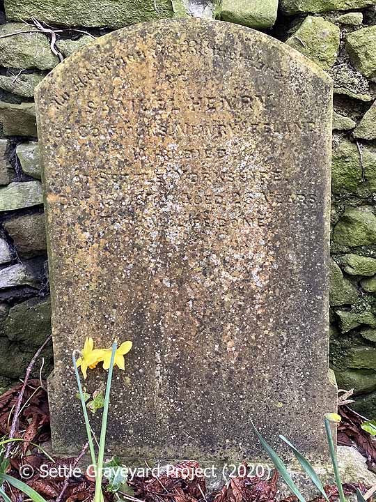 Gravestone in Settle Churchyard: "Samuel Henry of Commons, Newry, Ireland who died at Settle, Yorkshire Oct 15 1874, aged 25 years".