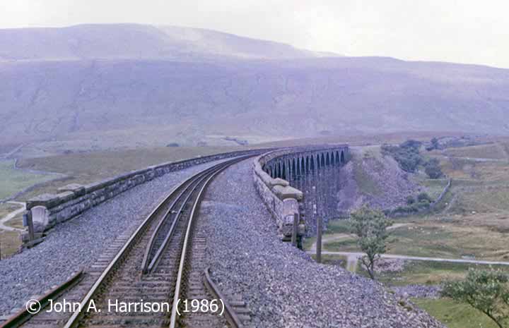 Single-track section across Ribblehead Viaduct (taken from train, looking NW).