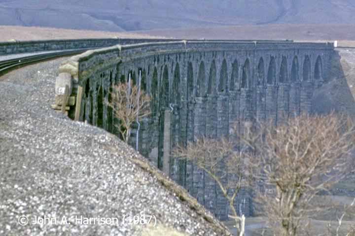 Ribblehead Viaduct NE face from southbound train looking NW. Note single track.