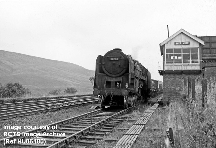Blea Moor Signal Box and 'Up' Tank House from the south with Cl 9F No. 92208.