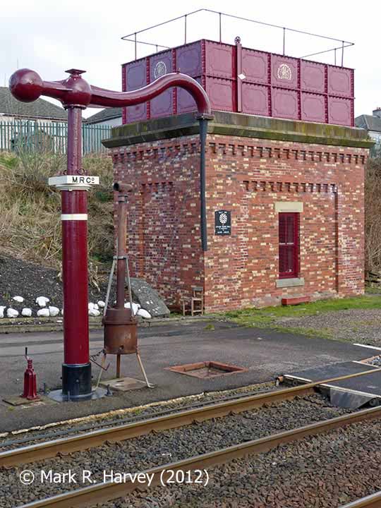 Appleby station rebuilt tank house and 'Up' side water crane, from the west (1).