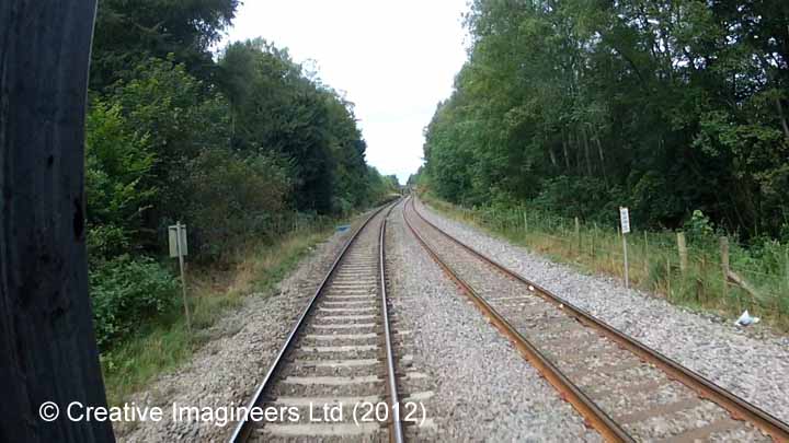 300390: Level Crossing: Cab-view video-still (northbound)