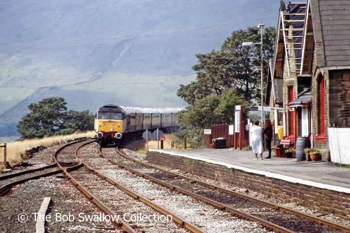 Class 47 with southbound passenger train approaching Ribblehead Station