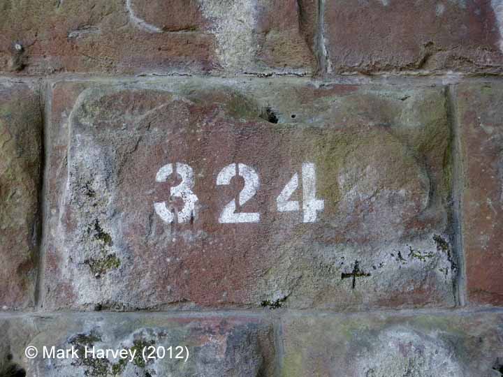 Bridge SAC/324 - Station road: Bridge number stencilled on NW pier stonework