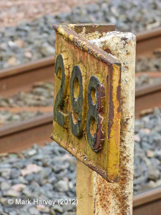 Milepost 298: Detail view of the number plate from the south-west