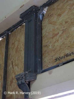 Glazed screen during restoration: 08 - Junction of column base, top & capital collar (interior).