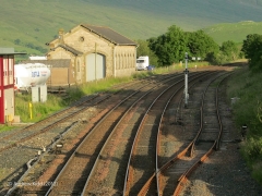 266410: Kirkby Stephen Station - Goods Shed: Context view from the north