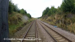272500: Milepost 272½: Cab-view video still (northbound)"