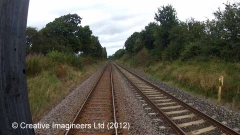 304500: Milepost 304½: Cab-view video-still (northbound)"