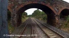305110: Store beneath bridge 349: Cab-view video-still (northbound)