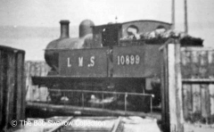 Steam loco no. 10899 in LMS livery on Garsdale Turntable, viewed from southwest