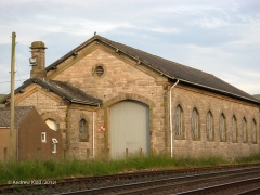 266410: Kirkby Stephen Station - Goods Shed: Context view from the north west