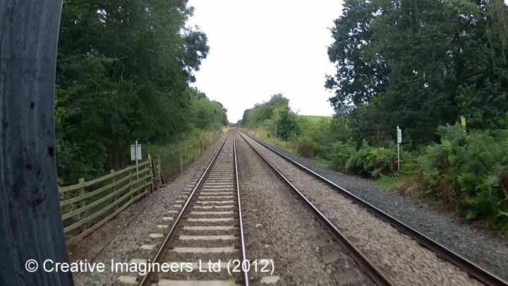 303880: Level Crossing: Cab-view video-still (northbound)